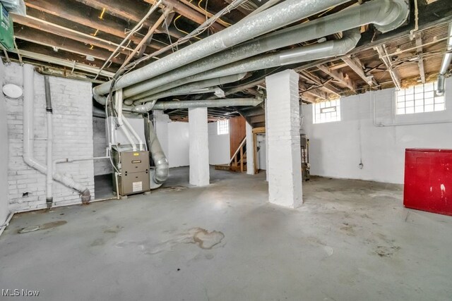 1586 E 86th St, Cleveland, OH 44106 - basement featuring heating unit and stairway