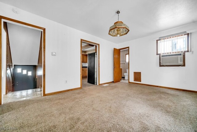 1586 E 86th St, Cleveland, OH 44106 - carpeted spare room with cooling unit and baseboards