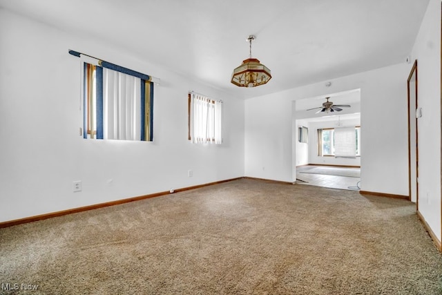 1586 E 86th St, Cleveland, OH 44106 - carpeted empty room with baseboards and ceiling fan