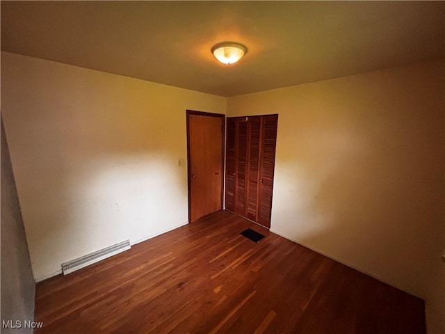 2325 Stewart Dr NW, Warren, OH 44485 - empty room featuring dark wood finished floors