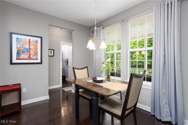 3413 Stillwood Blvd, Stow, OH 44224 - dining space featuring a chandelier, baseboards, and dark wood-style flooring