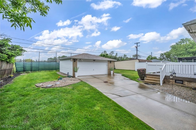 26601 Leslie Ave, Euclid, OH 44132 - view of yard featuring an outdoor structure, a garage, and a deck