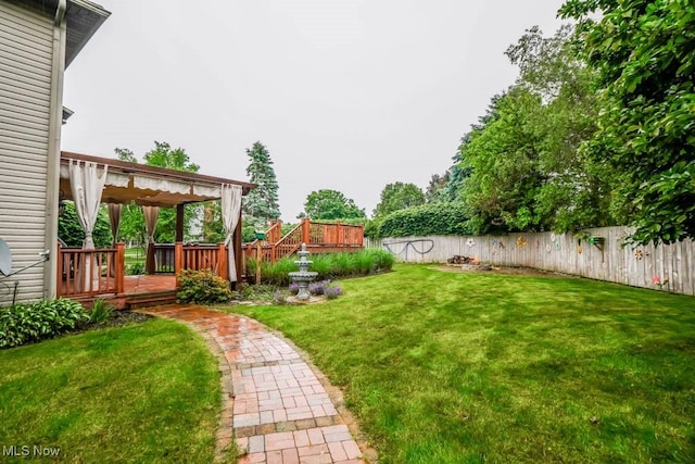2410 Rohrer St NW, North Canton, OH 44720 - view of yard with a wooden deck