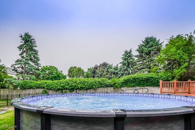 2410 Rohrer St NW, North Canton, OH 44720 - view of swimming pool with a fenced backyard