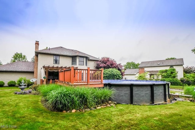 2410 Rohrer St NW, North Canton, OH 44720 - rear view of property with a deck, a chimney, and a pergola