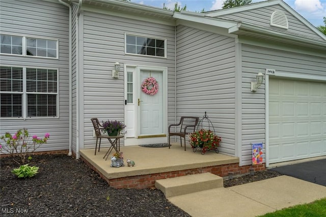 1441 Shaw Ave Unit A, Niles, OH 44446 - entrance to property featuring covered porch and a garage