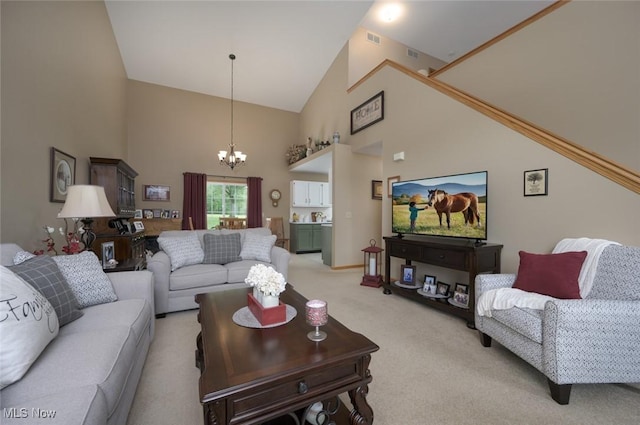 1441 Shaw Ave Unit A, Niles, OH 44446 - living area featuring high vaulted ceiling, a chandelier, and light carpet
