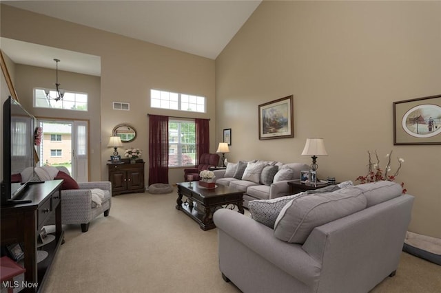 1441 Shaw Ave Unit A, Niles, OH 44446 - living area with high vaulted ceiling and light carpet