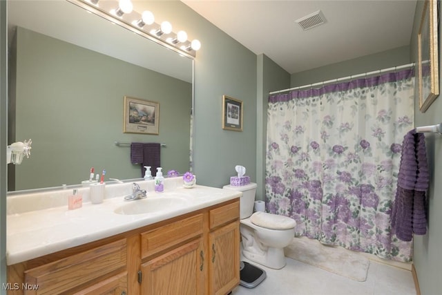 1441 Shaw Ave Unit A, Niles, OH 44446 - bathroom with toilet, vanity, tile patterned floors, and curtained shower