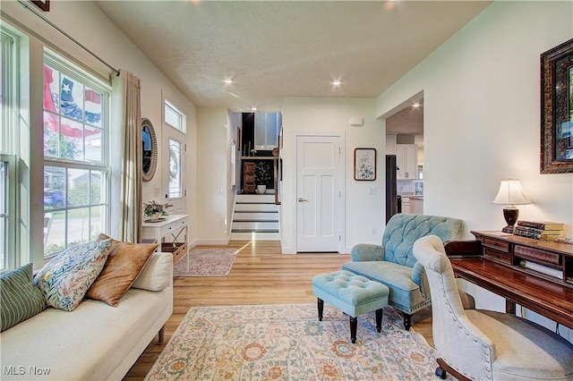 1572 Gate House St NE, Canton, OH 44721 - living room with wood finished floors, recessed lighting, and stairs