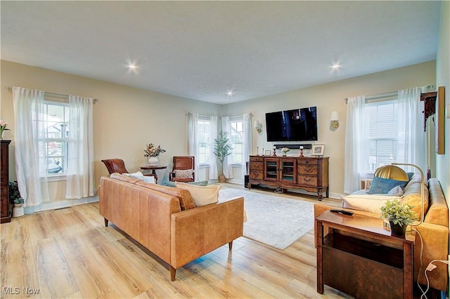 1572 Gate House St NE, Canton, OH 44721 - living area with light wood finished floors, recessed lighting, and baseboards