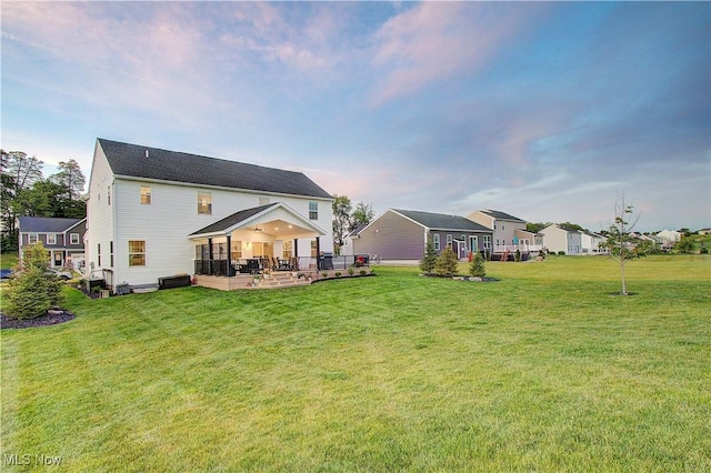 1572 Gate House St NE, Canton, OH 44721 - rear view of house featuring a lawn
