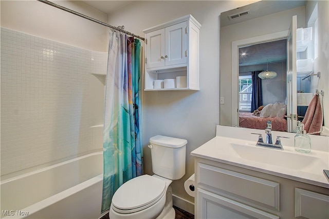 1572 Gate House St NE, Canton, OH 44721 - ensuite bathroom with vanity, shower / tub combo with curtain, and toilet