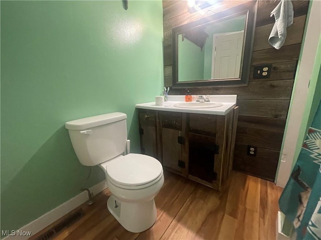 2743 Cow Creek Rd, Saint Marys, WV 26170 - bathroom featuring vanity, toilet, and wood finished floors