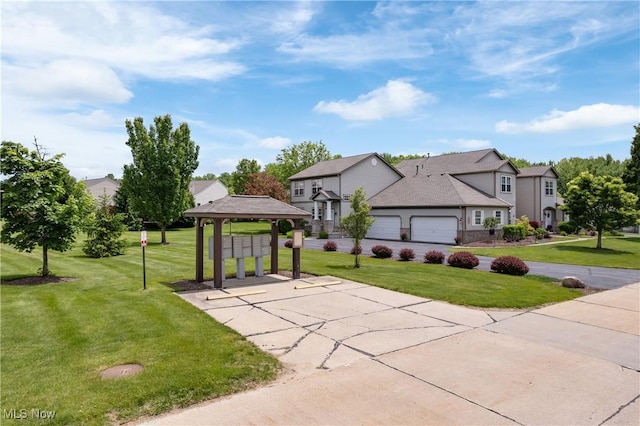 7284 Forest Cove Ln, Northfield, OH 44067 - view of home's community featuring mail area, a gazebo, a yard, and a garage