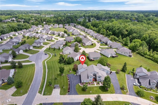 7284 Forest Cove Ln, Northfield, OH 44067 - aerial perspective of suburban area with a heavily wooded area