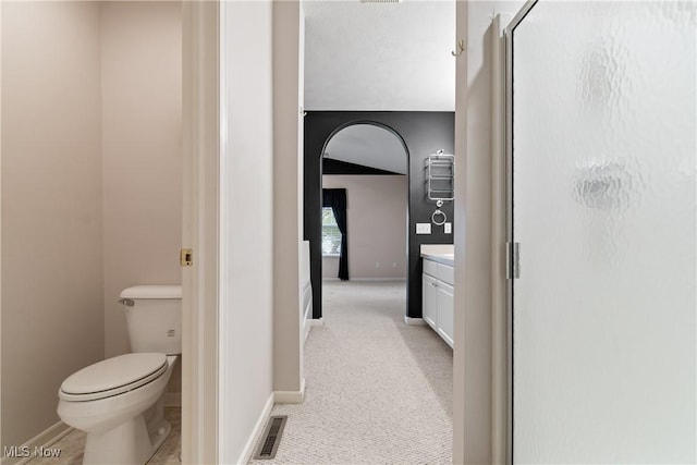 7284 Forest Cove Ln, Northfield, OH 44067 - full bathroom featuring a stall shower, vanity, toilet, and baseboards