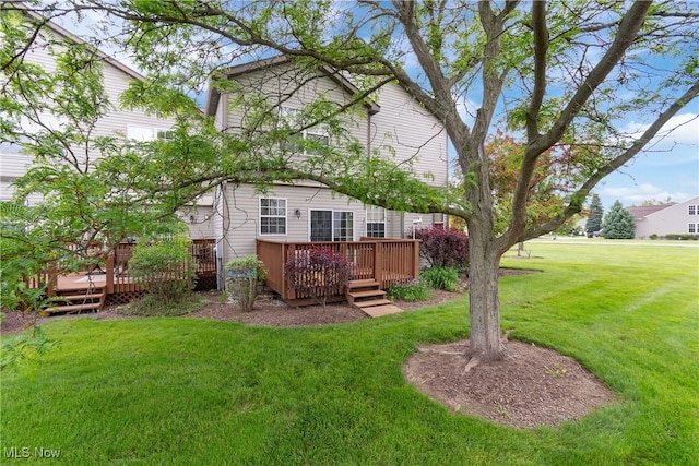 7284 Forest Cove Ln, Northfield, OH 44067 - view of green lawn featuring a wooden deck