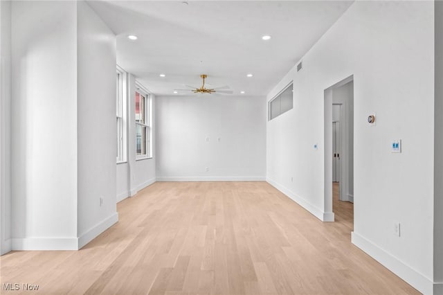 629 Euclid Ave Unit 1510, Cleveland, OH 44114 - spare room featuring a ceiling fan, recessed lighting, light wood-style floors, and baseboards