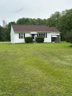 5806 Risher Rd, Leavittsburg, OH 44430 - rear view of property with a yard