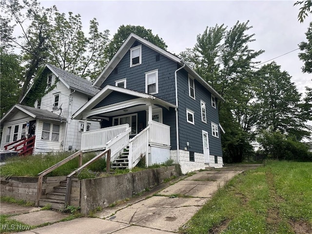 987 Boone St, Akron, OH 44306 - traditional style home with stairs and a porch