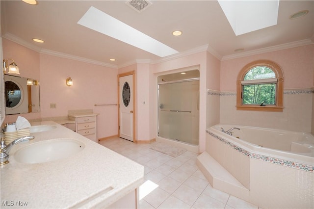 4219 Olde Charted Trl, Poland, OH 44514 - full bathroom with stacked washer and clothes dryer, a skylight, double vanity, a whirlpool tub, and a shower stall