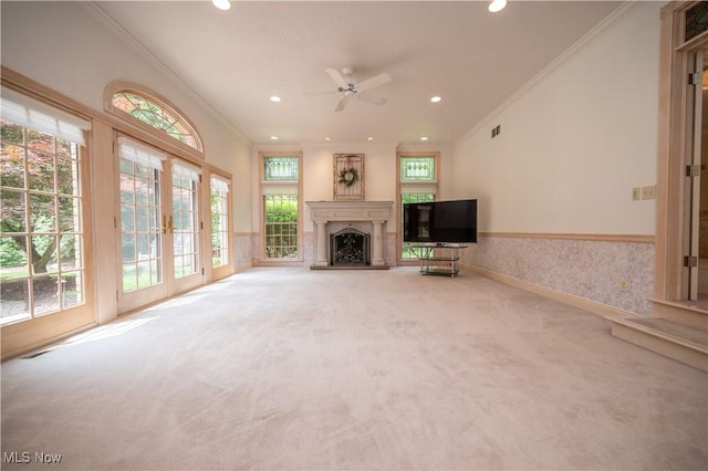 4219 Olde Charted Trl, Poland, OH 44514 - unfurnished living room with carpet flooring, crown molding, ceiling fan, french doors, and recessed lighting