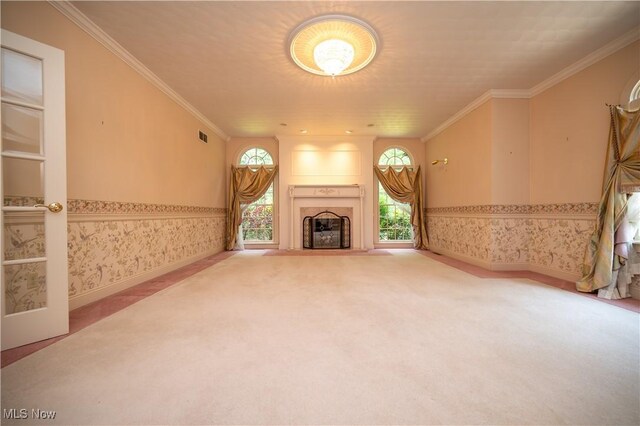 4219 Olde Charted Trl, Poland, OH 44514 - unfurnished living room featuring carpet, a fireplace, wallpapered walls, crown molding, and baseboards