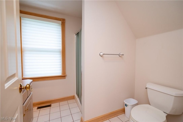 4219 Olde Charted Trl, Poland, OH 44514 - full bath featuring toilet, a shower stall, tile patterned flooring, baseboards, and lofted ceiling