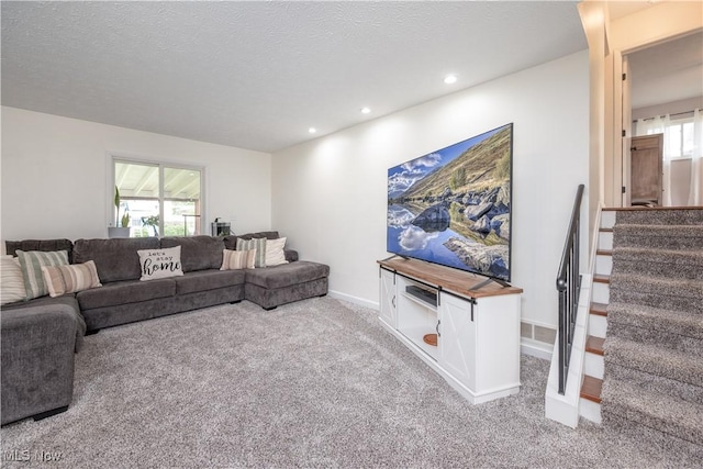 488 Spaulding Dr, Kent, OH 44240 - living room featuring carpet floors, plenty of natural light, recessed lighting, stairway, and a textured ceiling
