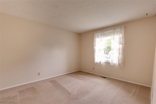 4285 Baird Rd, Stow, OH 44224 - unfurnished room featuring light carpet and baseboards