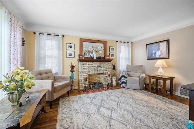 14300 Bidwell Ave, Cleveland, OH 44111 - living room with wood finished floors and a stone fireplace