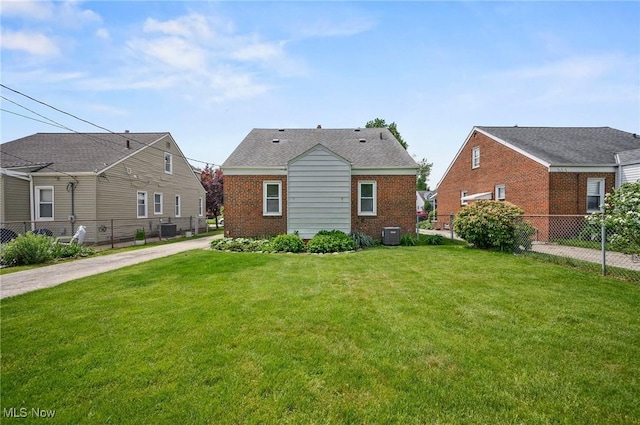 14300 Bidwell Ave, Cleveland, OH 44111 - view of front of house with brick siding and central AC