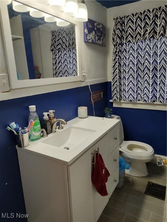 1028 Kenilworth Ave, Coshocton, OH 43812 - bathroom with vanity and toilet