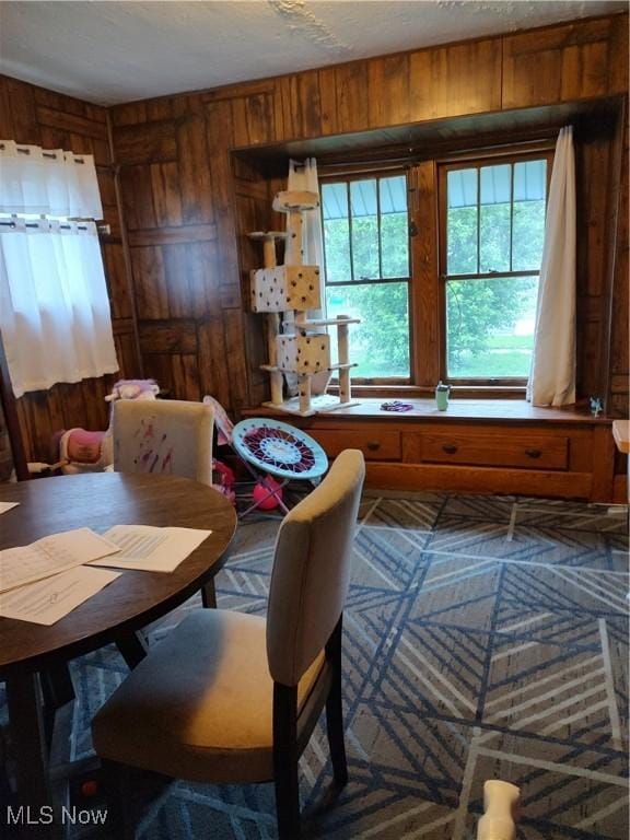 1028 Kenilworth Ave, Coshocton, OH 43812 - dining area with wooden walls
