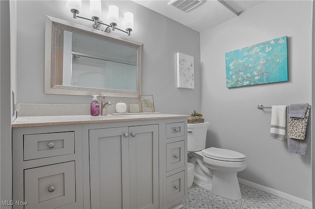 186 Court Dr Unit 201, Fairlawn, OH 44333 - bathroom with toilet, vanity, baseboards, and tile patterned flooring