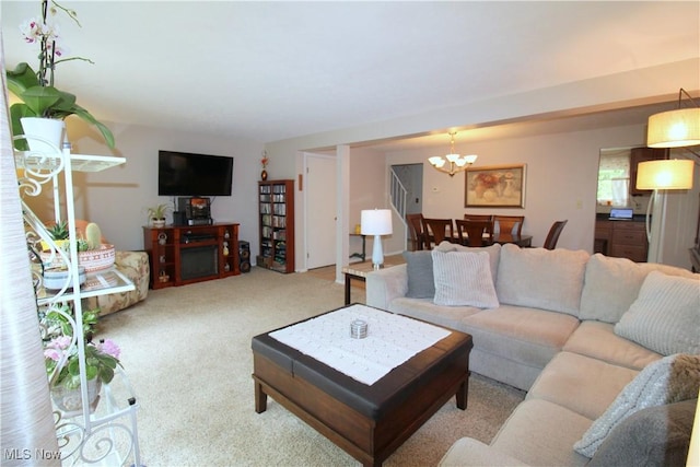 6478 State Rd Unit G8, Parma, OH 44134 - living area with a chandelier and carpet flooring