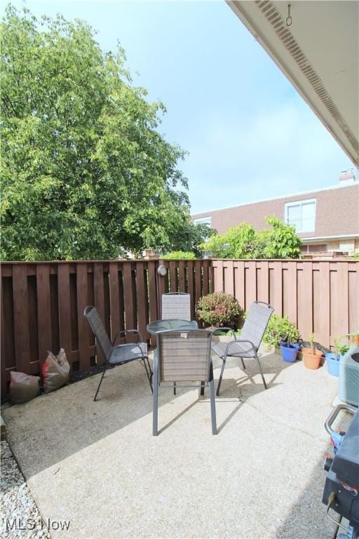 6478 State Rd Unit G8, Parma, OH 44134 - view of patio featuring outdoor dining space