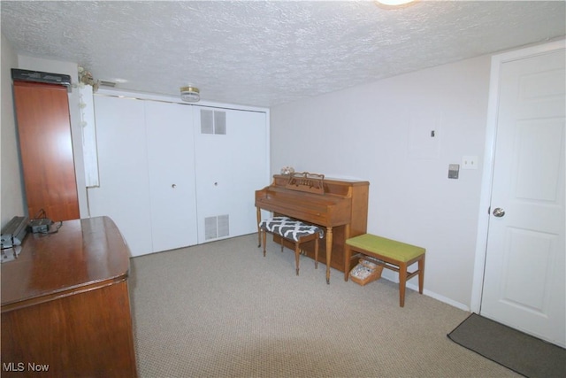 6478 State Rd Unit G8, Parma, OH 44134 - sitting room with carpet floors and a textured ceiling
