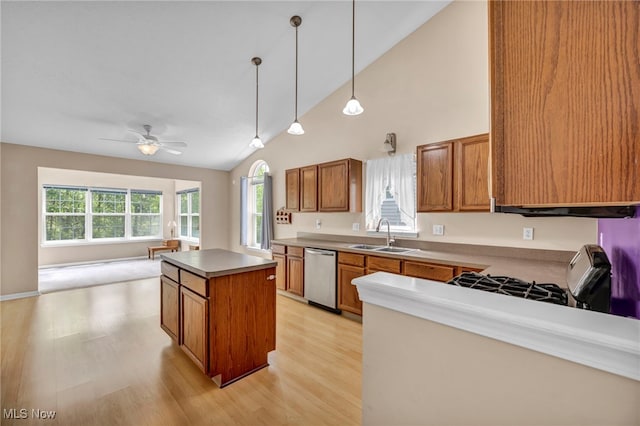 2716 Edgebrook Xing, Twinsburg, OH 44087 - kitchen featuring a sink, dishwasher, brown cabinetry, light wood-style flooring, and ceiling fan