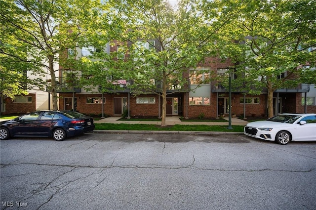 1257 W 75th St Unit D1257, Cleveland, OH 44102 - view of property with brick siding