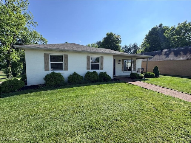 2187 State Route 550, Cutler, OH 45724 - view of front of home with a front yard and brick siding