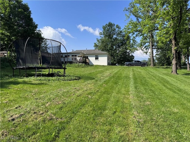 2187 State Route 550, Cutler, OH 45724 - view of green lawn with a trampoline