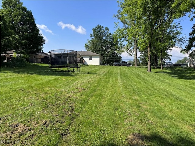 2187 State Route 550, Cutler, OH 45724 - view of green lawn with a trampoline