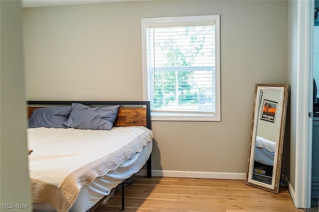 2187 State Route 550, Cutler, OH 45724 - bedroom featuring light wood-type flooring and baseboards