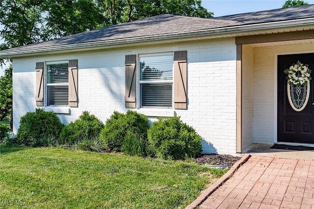 2187 State Route 550, Cutler, OH 45724 - property entrance featuring brick siding and a shingled roof