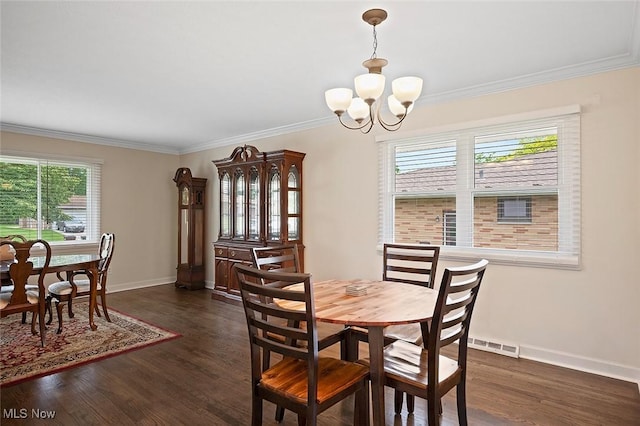 7278 Barton Hill Dr, Parma, OH 44129 - dining area featuring a chandelier, crown molding, baseboards, and dark wood-style floors