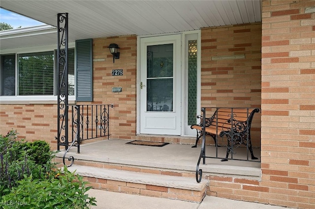 7278 Barton Hill Dr, Parma, OH 44129 - property entrance with brick siding and covered porch