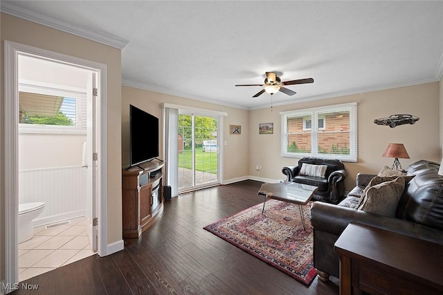 7278 Barton Hill Dr, Parma, OH 44129 - living room with a ceiling fan, wood finished floors, crown molding, and baseboards