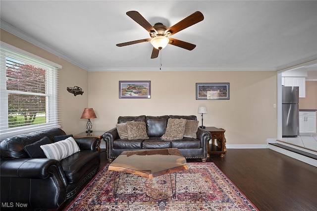 7278 Barton Hill Dr, Parma, OH 44129 - living area with dark wood-style flooring, a ceiling fan, ornamental molding, and baseboards